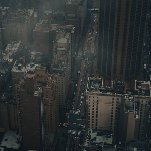 Aerial city blocks at dusk
